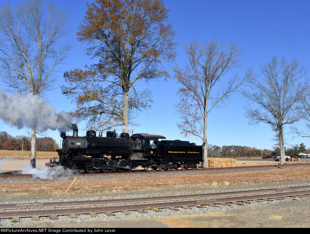 The SMS Restored 0-6-0 9 steam locomotive heading away from the cameras toward the S. Woodstown Depot 